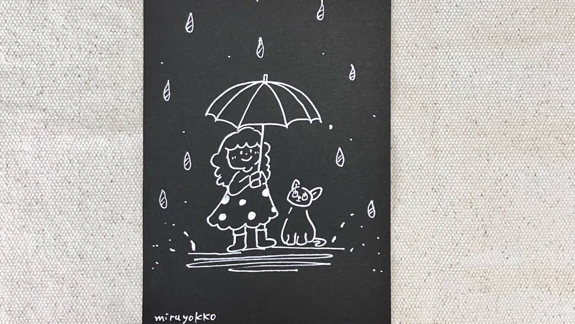 黒紙に描いたイラスト